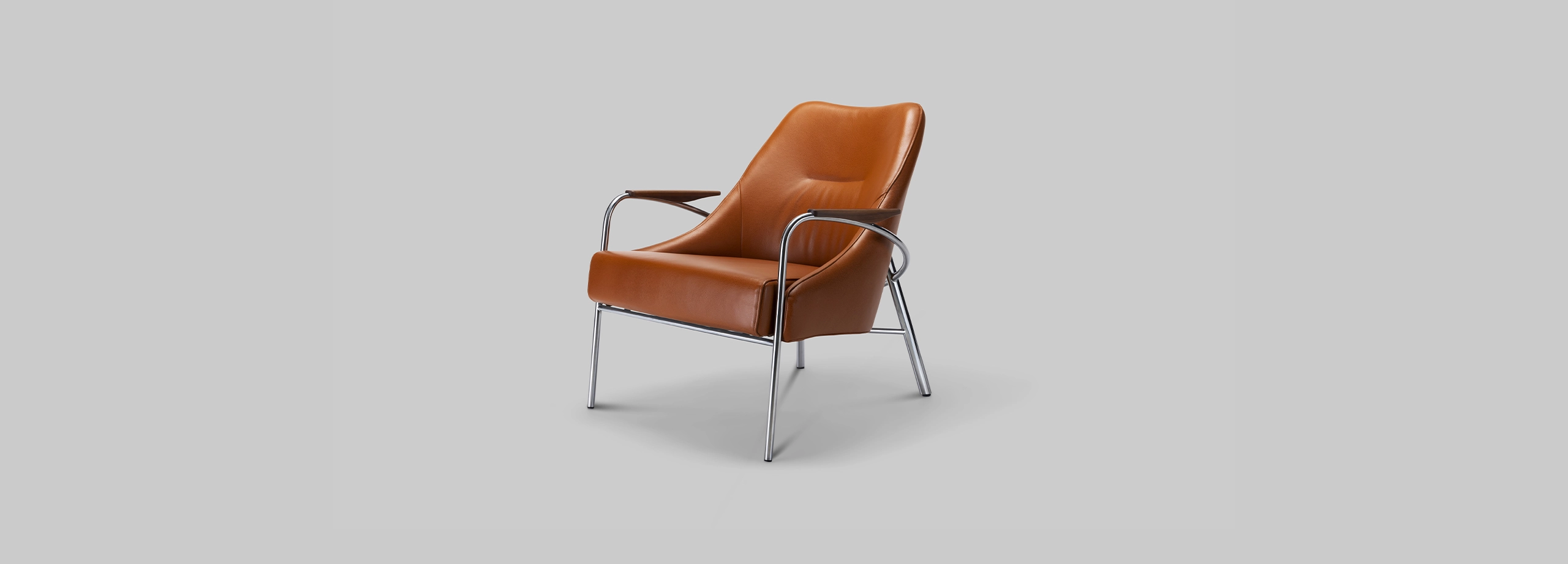 Harvink fauteuil Blazoen met armlegger in leer club cognac met frame geschuurd chroom