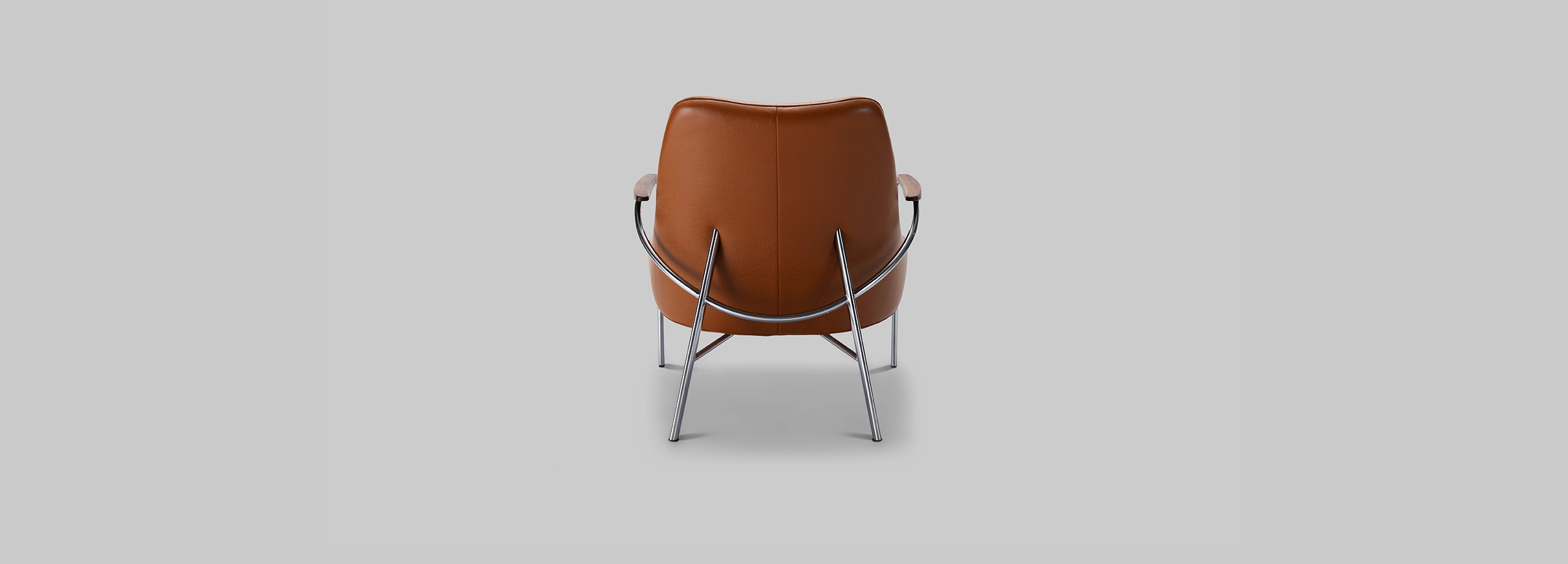 Harvink fauteuil Blazoen met armlegger in leer club cognac met frame geschuurd chroom